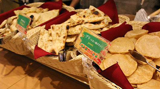 Naan baked in a tandoor oven