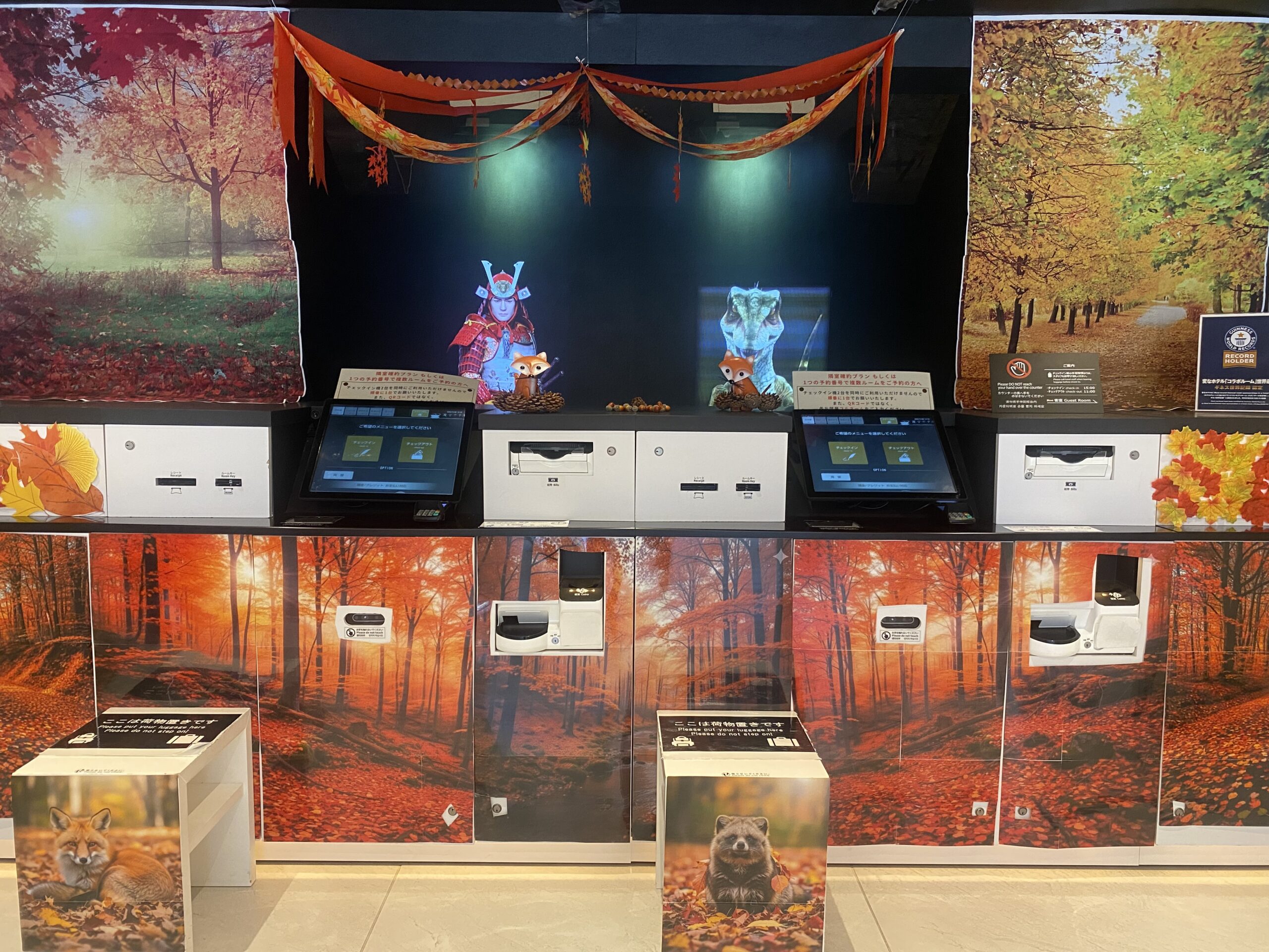 The front desk has been decorated with autumn leaves.