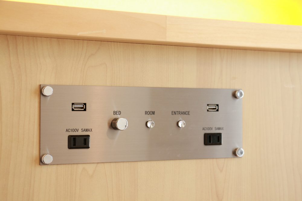 The control panel is located by the bedside. It has a USB port.