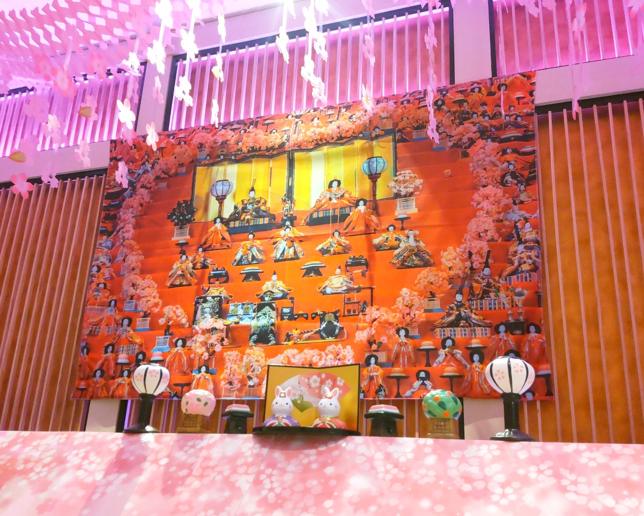 The front desk has been decorated for the Hinamatsuri festival starting today 🎎