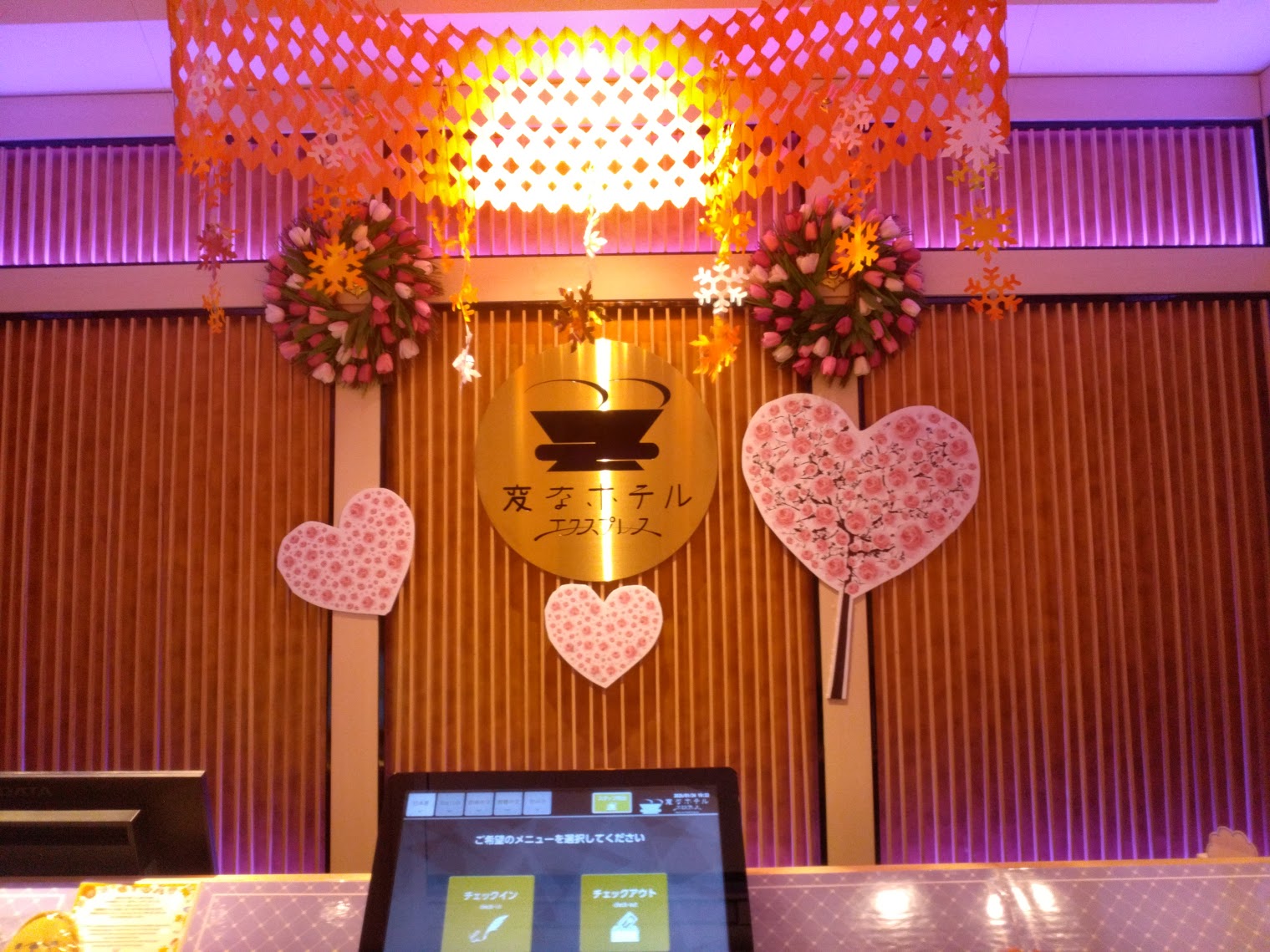 The front desk has been decorated for Valentine's Day.